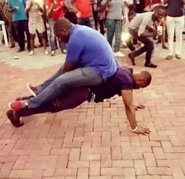 #BBNaija: Kemen Challenged To Do 20 Push Ups While Carrying Man Weighing 114kg (Video)